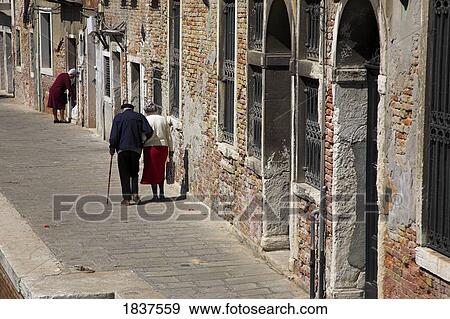 Stock Photo - Old Buildings And People; Venice, Italy. Fotosearch
