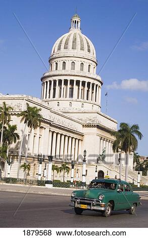 Stock Photo - Old Car In Front Of Capitolio. Fotosearch