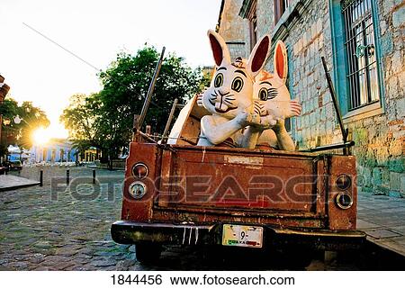 Old Car With Kitsch Figurines Of Rabbits On The Street; Mexico View Large Photo Image Stock Photograph - Old Car With Kitsch Figurines Of Rabbits On The Street; Mexico. Fotosearch