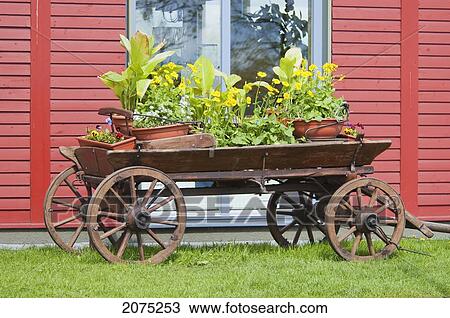 Stock Image - Old Cart With Flowers, Trakai, Lithuania. Fotosearch
