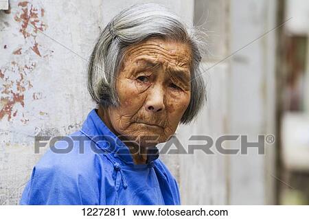 Old Chinese woman, Hongcun, Anhui, China View Large Photo Image Stock Image - Old Chinese woman, Hongcun, Anhui, China. Fotosearch