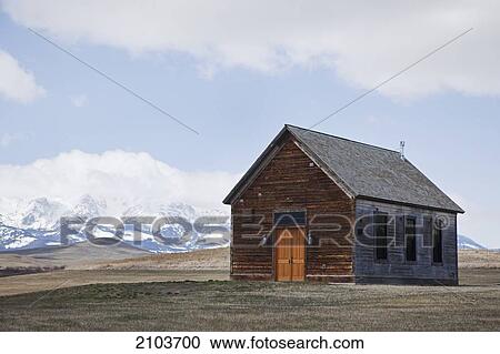 Stock Image - Old Farm House In The Countryside Near Bozeman; Montana United States Of America. Fotosearch