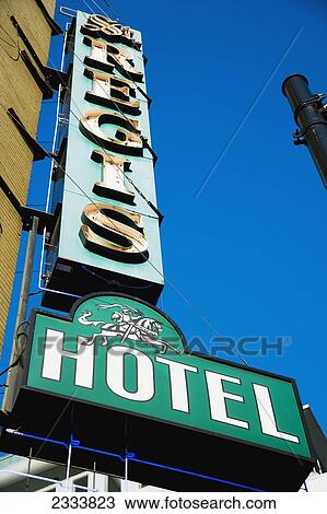 Stock Image - Old Fashioned Sign For Regis Hotel; Vancouver, British Columbia, Canada. Fotosearch
