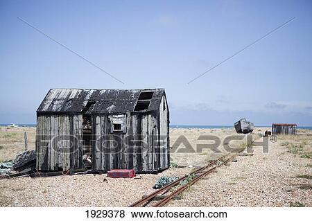 Old Fishermens Huts On The Beach In Dungeness, Kent, Uk View Large Photo Image Stock Photo - Old Fishermens Huts On The Beach In Dungeness, Kent, Uk. Fotosearch