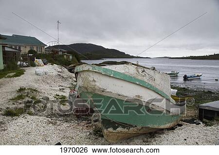 Stock Photograph - Old Fishing Boat At Harbor In Puerto Aguirre, Aysen Region, Chile. Fotosearch