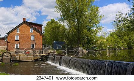 Stock Image - Old Grain Mill, Now Mississquoi Museum; Stanbridge East, Quebec, Canada. Fotosearch