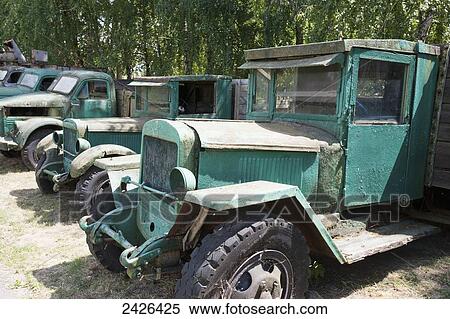 Old green trucks parked in a row; Kiev, Ukraine View Large Photo Image Stock Photography - Old green trucks parked in a row; Kiev, Ukraine. Fotosearch