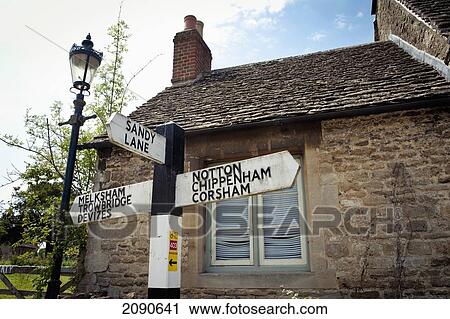 Old House And Directions Sign In Lacock, Wiltshire, Uk View Large Photo Image Stock Image - Old House And Directions Sign In Lacock, Wiltshire, Uk. Fotosearch
