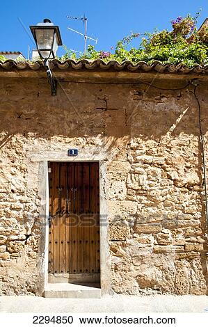 Stock Image - Old House In Alcudia, Mallorca, Balearic Islands, Spain. Fotosearch