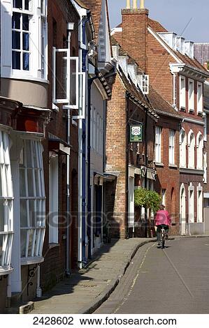 Stock Image - Old houses along a street; Winchester, Hampshire, England. Fotosearch