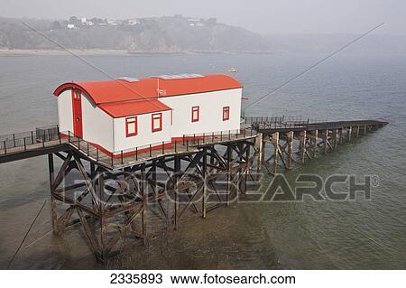 Stock Image - Old Lifeboat Station; Tenby, Pembrokeshire Coast Path, Wales, United Kingdom. Fotosearch