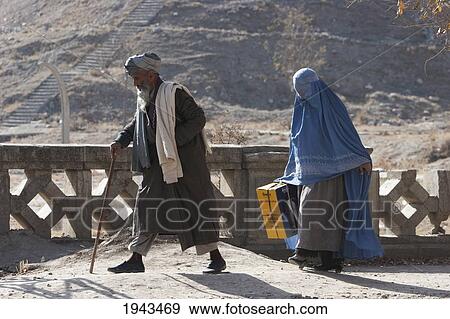 Old Man And Woman Wearing A Burqa On A Kabul Street,, Afghanistan View Large Photo Image Stock Photo - Old Man And Woman Wearing A Burqa On A Kabul Street,, Afghanistan. Fotosearch