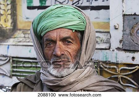 Stock Image - Old Man Waiting For Aid And Relief Goods Near The Line Of Control, Chakothi, Azad Kashmir, Pakistan. Fotosearch