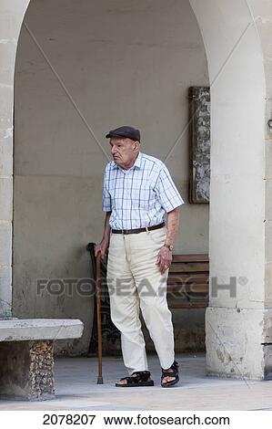 Stock Photo - Old Man Walking With A Cane, Rabat, Malta. Fotosearch
