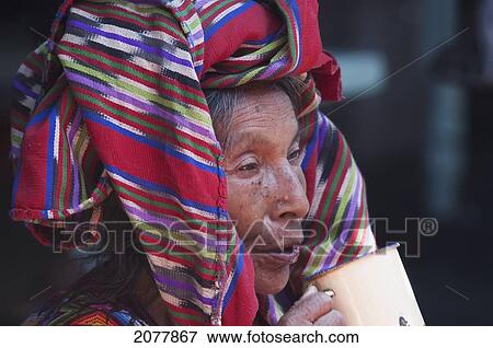 Old Maya Woman Drinking Tea, Chichicastenango, El Quich View Large Photo Image Stock Photo - Old Maya Woman Drinking Tea, Chichicastenango, El Quich. Fotosearch