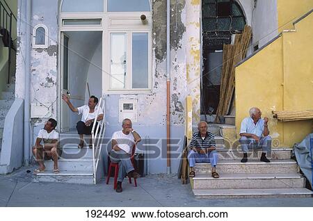 Stock Image - Old Men In A Fishing Village. Fotosearch