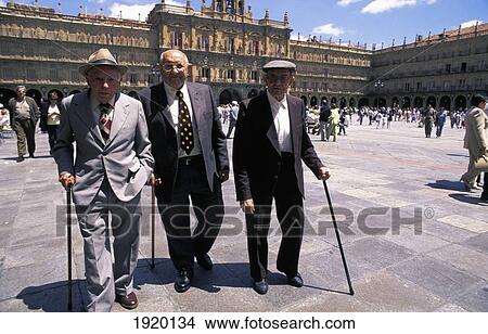 Picture - Old Men Taking A Stroll, Plaza Mayor. Fotosearch