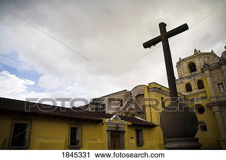 Stock Image - Old Metal Cross- Detail Of Building; Antigua, Guatemala. Fotosearch