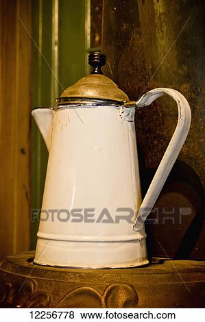 Stock Photo - Old metal kettle on the stove in the Kilby Museum General Store; Harrison Mills, British Columbia, Canada. Fotosearch