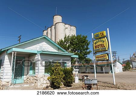 Stock Image - Old Motel Beside A Grain Elevator, Tulia, Texas Panhandle, Usa. Fotosearch