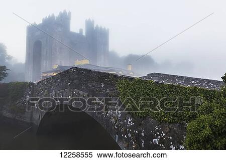 Old stone bridge with castle in the background and fog; Bunratty, County Clare, Ireland View Large Photo Image Stock Photography - Old stone bridge with castle in the background and fog; Bunratty, County Clare, Ireland. Fotosearch