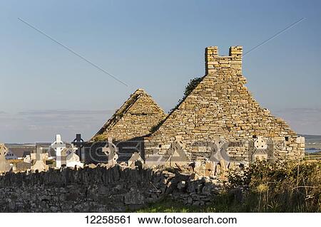 Old stone roofless church and cemetery with celtic crosses and blue sky; Cross, County Clare, Ireland View Large Photo Image Stock Image - Old stone roofless church and cemetery with celtic crosses and blue sky; Cross, County Clare, Ireland. Fotosearch