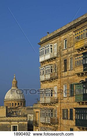 Stock Image - Old Town Buildings With Carmelite Church In Background. Fotosearch