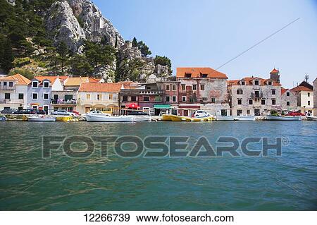 Old town Omis as seen from the Cetina River; Omis, Croatia View Large Photo Image Stock Photo - Old town Omis as seen from the Cetina River; Omis, Croatia. Fotosearch