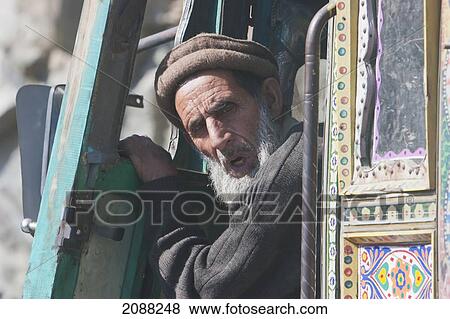 Stock Photo - Old Truck Driver, Dasu, North-West Frontier Province, Pakistan. Fotosearch