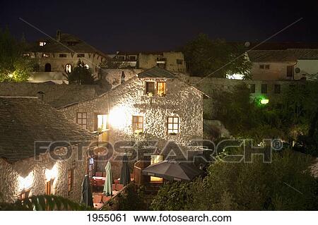 Stock Image - Old Turkish Houses At Night, Mostar, Herzegovina-Neretva, Bosnia And Herzegovina. Fotosearch