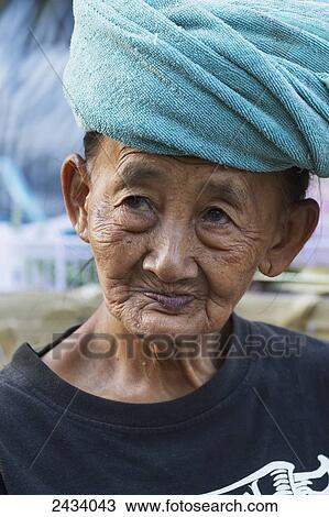 Old woman at the morning market, Sukawati, Bali, Indonesia View Large Photo Image Stock Image - Old woman at the morning market, Sukawati, Bali, Indonesia. Fotosearch