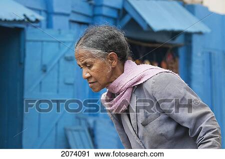 Stock Image - Old Woman In Antananarivo, Madagascar. Fotosearch