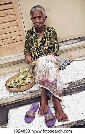 Old Woman Peeling Vegetables View Large Photo Image Stock Image - Old Woman Peeling Vegetables. Fotosearch