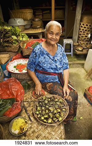 Oldwoman Peeling Vegetables View Large Photo Image Stock Image - Oldwoman Peeling Vegetables. Fotosearch