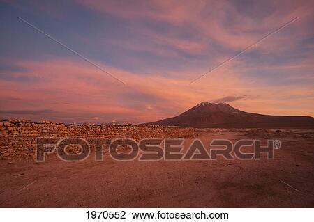 Stock Image - Ollague Volcano At Dusk, Antofagasta Region, Chile. Fotosearch