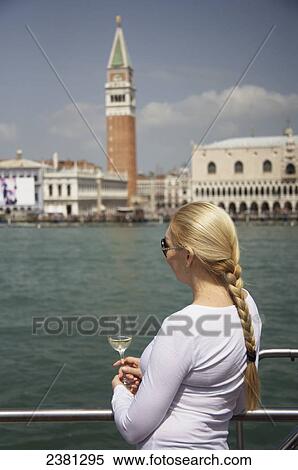 Stock Photography - On a river cruiser on Giudecca canal, passing St Mark's square; Venice, Italy. Fotosearch