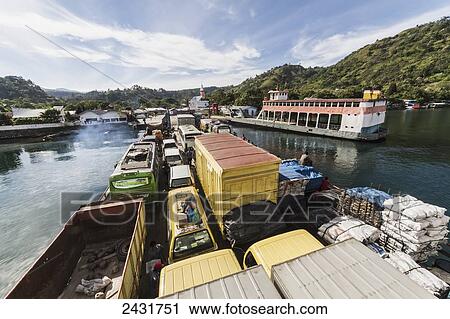 On board the car ferry between Parapat and Samosir Island, Parapat, Lake Toba, North Sumatra, Indonesia View Large Photo Image Stock Image - On board the car ferry between Parapat and Samosir Island, Parapat, Lake Toba, North Sumatra, Indonesia. Fotosearch