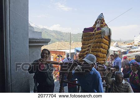 On Easter Sunday The Comrades (Council Men) Carry The Andas (Floats) Of The Saints In A Procession To The Santo Tom View Large Photo Image Picture - On Easter Sunday The Comrades (Council Men) Carry The Andas (Floats) Of The Saints In A Procession To The Santo Tom. Fotosearch