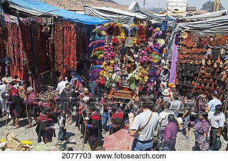 On Easter Sunday The Comrades (Council Men) Carry The Andas (Floats) Of The Saints In Procession Through The Streets Of Chichicastenango, El Quich View Large Photo Image Stock Image - On Easter Sunday The Comrades (Council Men) Carry The Andas (Floats) Of The Saints In Procession Through The Streets Of Chichicastenango, El Quich. Fotosearch