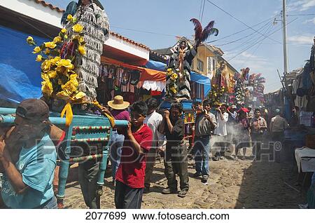 On Easter Sunday The Comrades (Council Men) Carry The Andas (Floats) Of The Saints In Procession Through The Streets Of Chichicastenango, El Quich View Large Photo Image Stock Photo - On Easter Sunday The Comrades (Council Men) Carry The Andas (Floats) Of The Saints In Procession Through The Streets Of Chichicastenango, El Quich. Fotosearch