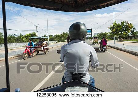 Stock Photography - On the way to the famous Angkor area; Siem Reap, Cambodia. Fotosearch