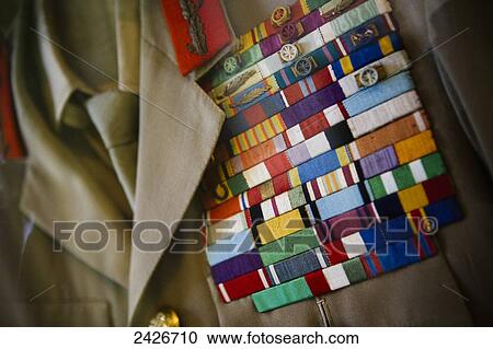 Stock Image - One of Haile Selassie's uniforms with medal ribbons, inside Haile Selassie's Grand Palace, a former University and locally known as Gannata Leul Palace; Addis Ababa, Ethiopia. Fotosearch