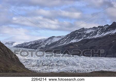 Picture - One of the many glaciers that originate from the vatnajokull ice cap in vatnajokull national park; iceland. Fotosearch