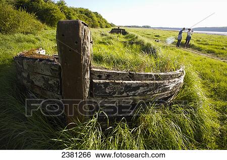 Stock Photograph - One of the Purton Hulks, boats beached to protect Gloucester & Sharpness canal; Gloucester, England. Fotosearch