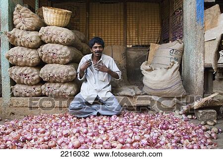 Onion Seller At Devaraja Market In Mysore, Karnataka, India View Large Photo Image Stock Image - Onion Seller At Devaraja Market In Mysore, Karnataka, India. Fotosearch