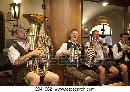 Stock Image - Oompapah Band Playing At The Hofbrauhaus Munich, Bavaria, Germany. Fotosearch