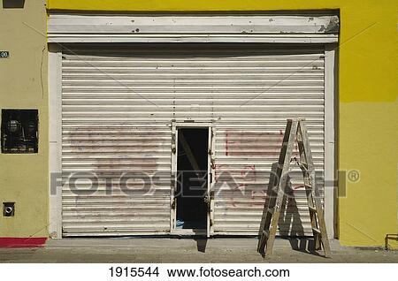 Picture - Opened Door And Ladder. Fotosearch