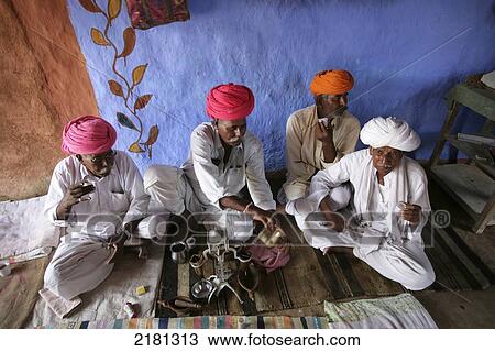 Opium Ceremony In Rural Desert Village Near Jodhpur Rajasthan India View Large Photo Image Stock Image - Opium Ceremony In Rural Desert Village Near Jodhpur Rajasthan India. Fotosearch
