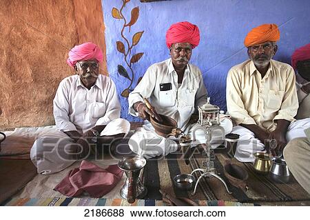 Opium Ceremony In Rural Desert Village Near Jodhpur Rajasthan India View Large Photo Image Stock Photo - Opium Ceremony In Rural Desert Village Near Jodhpur Rajasthan India. Fotosearch