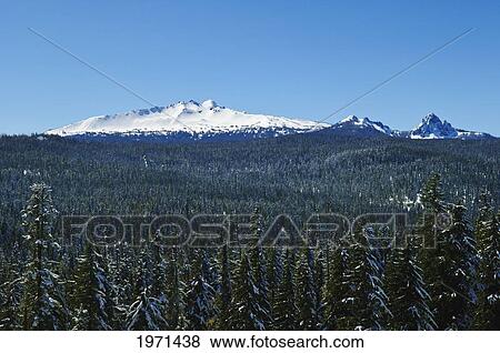 Stock Photo - Oregon, Cascade Mountains, Diamond Peak (Center-Left) And Mount Yoran (Right) From Highway 58 Viewpoint.. Fotosearch